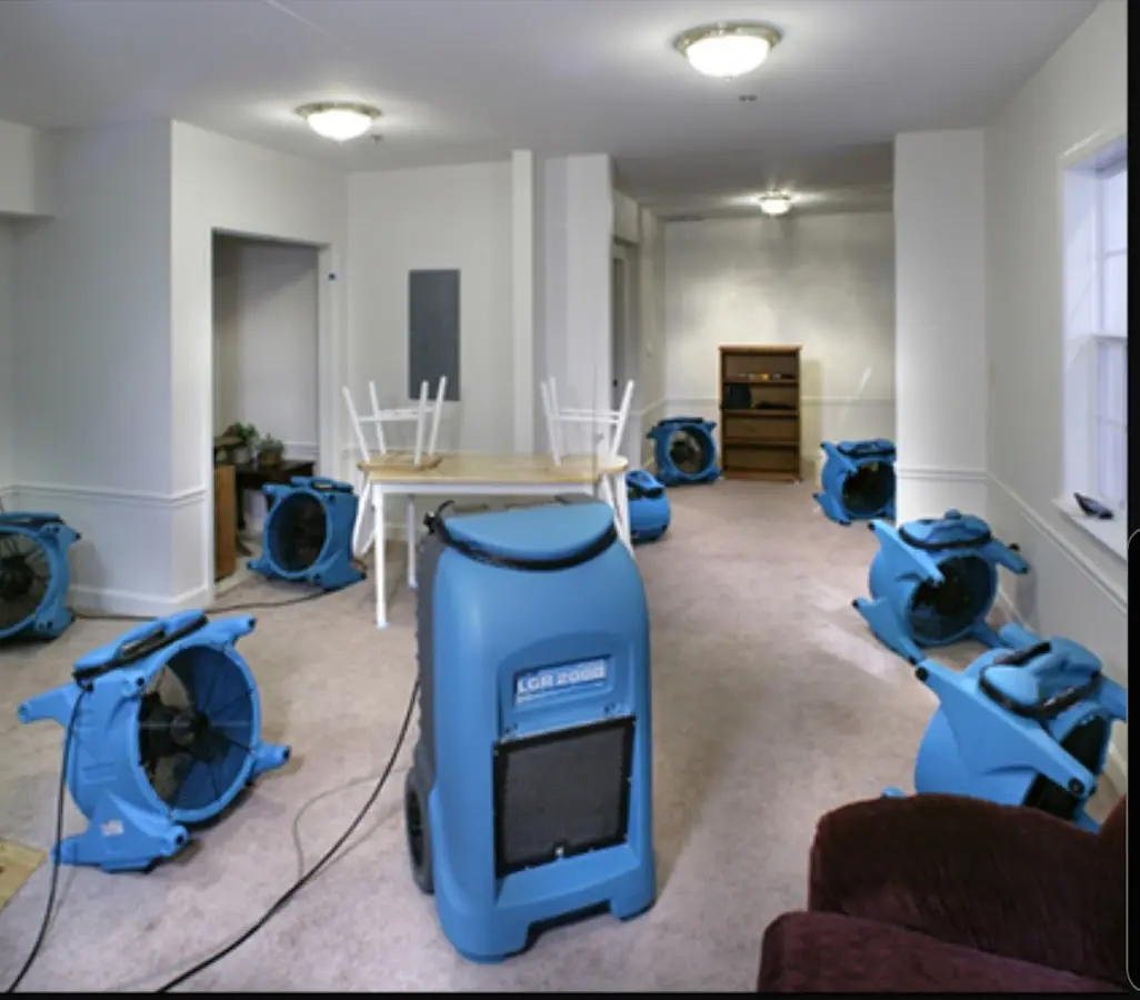 Air movers and dehumidifier setup for Water Extraction & Removal in Denton